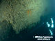 Gaping breach left by the torpedo hit.